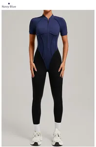 Detail of navy blue short-sleeved fitness jumpsuit with stitching and contrast panels