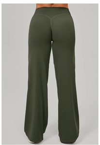 Vue arrière du pantalon de yoga vert foncé taille haute avec couture en V fessier