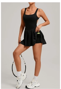 Detail of athletic tennis dress with pleated skirt and side pocket for ball storage
