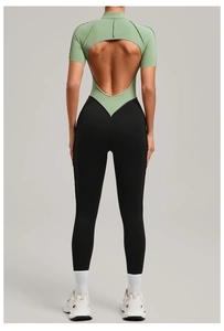 Detail showing the cutout back design and sage green contrast of this yoga bodysuit