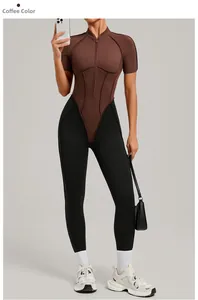 Close-up of contrast color yoga bodysuit with coffee top, black bottom and front zipper