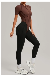 Detail view of contrast stitching and back cutout on athletic fitness bodysuit