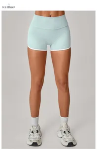 Detail view of ice blue yoga shorts with white contrast binding and high-waist fit