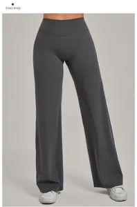 Détail du pantalon de yoga gris anthracite à taille haute et coupe large en maille