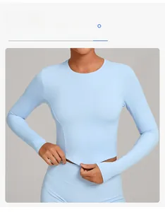 Close-up of sky blue tight yoga top with high-stretch fabric and slim fit design