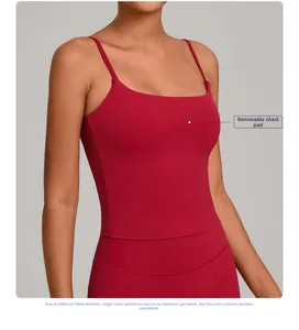 Detail view of dark red sports tank top featuring slim straps and removable chest pads