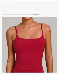 Detail of square neck and thin shoulder straps on dark red stretchy yoga tank top