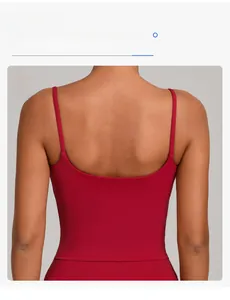Detail view of burgundy yoga vest featuring wide hem design and low U-shaped back profile