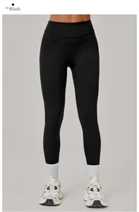 Détail du legging de yoga noir à taille haute avec coutures parallèles renforcées à la taille