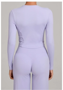 Detailed back view of light purple yoga set showing V-shaped contouring stitching