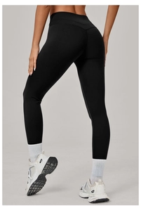 Vue arrière du legging de yoga taille haute avec couture en V et effet galbant fessier