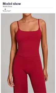 Detail view of ruby red yoga set featuring a U-neck sports bra and high-waist leggings