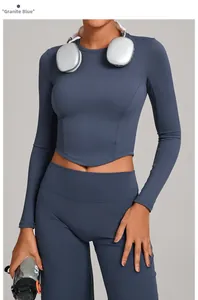 Close-up of granite blue yoga top showing breathable elastic fabric and slim fit design