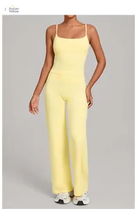Detail of high-waist flared yoga trousers and camisole set in durian yellow