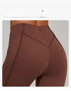 Detail of high waisted yoga flare pants showing back V-shaped seam for butt lifting effect
