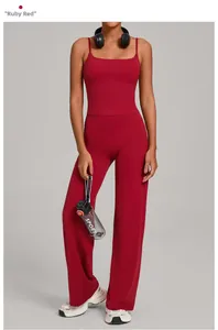 Detail view of ruby red yoga set featuring high-waist flare pants and a camisole top