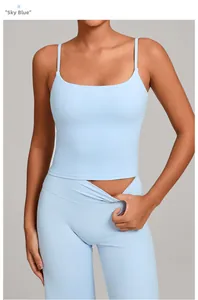 Detail of sky blue sports yoga set featuring slim strap top and high waisted shorts