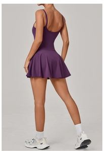 Detail of dark purple sports dress with thin straps and open back design