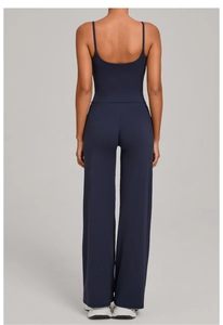 Detail view of the back of navy blue yoga set with camisole top and wide-leg trousers