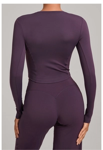 Rear view of tight plum purple yoga set with ergonomic V-seam stitching for butt lifting
