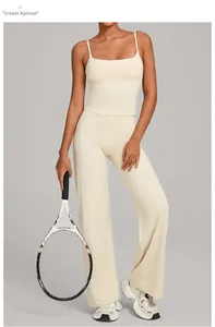 Detail of cream yoga set with strappy tank top and high-waist wide-leg pants
