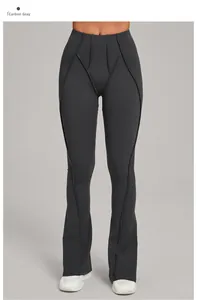 Detail shot of charcoal gray high waist flare yoga pants with decorative stitching