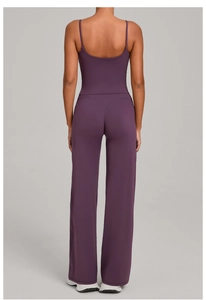 Detail of high-waist wide-leg yoga pants featuring V-shaped back waistband stitching