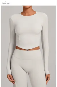 Detail of warm stone gray yoga set with long sleeve crop top and curved V-shape hemline