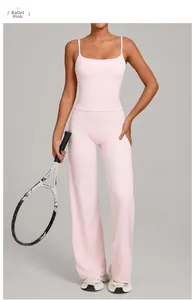 Detail view of ballet pink yoga set featuring a camisole top and high-waisted wide-leg pants