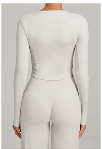 Detail showing high-stretch fabric and peach-butt seam design of the yoga set
