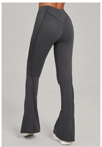 Detail of high waist yoga flare pants with V-shaped back seam and slimming butt lift effect