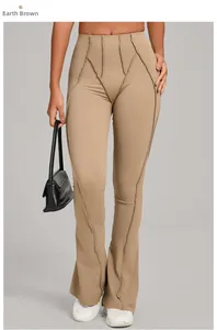 Detail view of high waist flared yoga pants in clay brown with vertical stitching