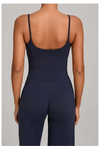Rear view of navy blue yoga set featuring U-neck backless top and high-waist V-seam leggings