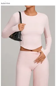 Detail of ballet pink yoga set featuring a V-shaped slim fit cropped top and high waist leggings