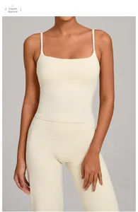Close-up of cream apricot yoga set showing fine straps and tight elastic fabric texture
