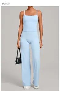 Detail of sky blue sports set with thin strap top and high waist wide leg yoga pants