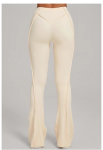 Detail view of high-waisted flared yoga pants with back V-shape stitching for butt lifting