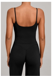 Close-up back view of black U-shaped open back sports vest with high waist yoga pants