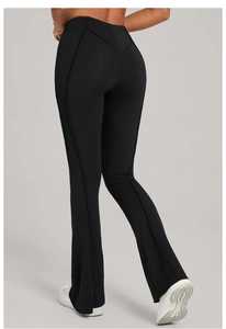 Detail view of high waist flared yoga pants with V-shaped stitching and leg seam accents