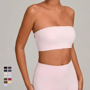 Set yoga rosa in due pezzi con top a tubo e leggings a vita alta per il fitness