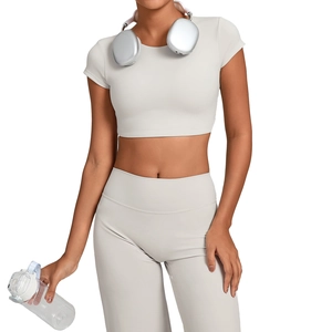 Set sportivo donna con maglia senza schiena e leggings yoga a vita alta beige