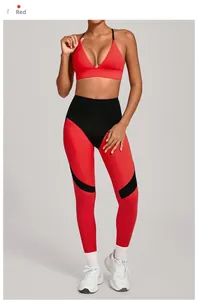 Detail of red V-neck sports bra and high-waisted color-block leggings yoga set