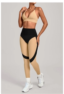 Detail view of high-waist yoga set with khaki and black splicing on leggings and sports bra