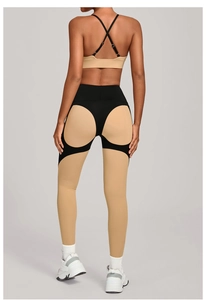 Detail view of high-waist yoga leggings with black curved lines for butt-lifting effect