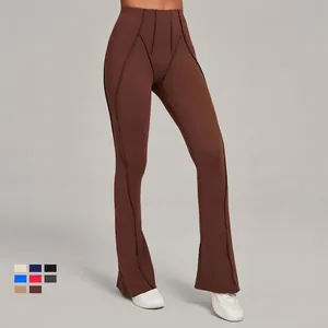 High-waist brown flared yoga pants with V-shaped waistband and body-shaping design