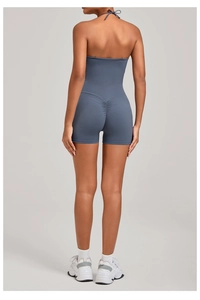 Vue arrière d'un body de yoga dos nu bleu-gris avec effet scrunch et poches latérales