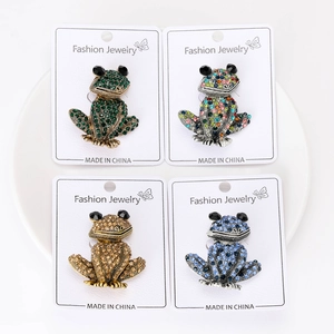 Lot de quatre broches grenouilles avec strass en émeraude, ambre, bleu et multicolore
