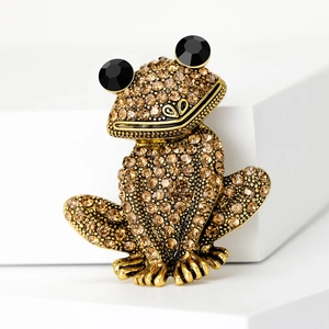 Broche grenouille de dessin animé scintillante avec strass bruns et yeux en pierres noires