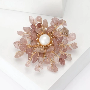 Handmade flower brooch with pink natural stones, white pearl, and gold wire wrap details