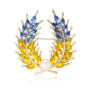 Broche épi de blé élégante avec cristaux bleus et jaunes et une grande perle blanche